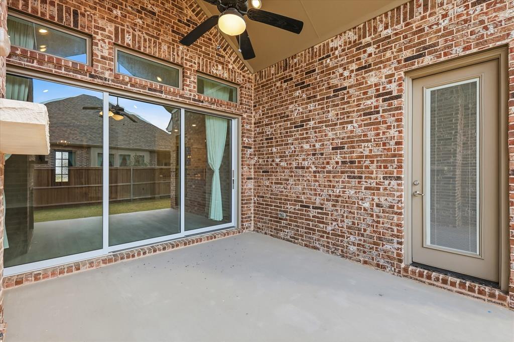 910 Cone Flower Drive Prosper, TX 75078 - Photo 33 of 40 a view of an entrance to house