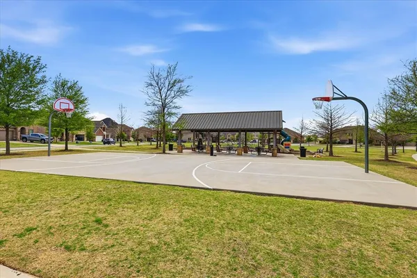 a view of a park with swings
