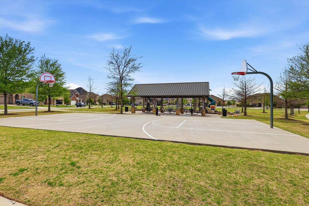 910 Cone Flower Drive Prosper, TX 75078 - Photo 38 of 40 a swimming pool with outdoor seating and yard