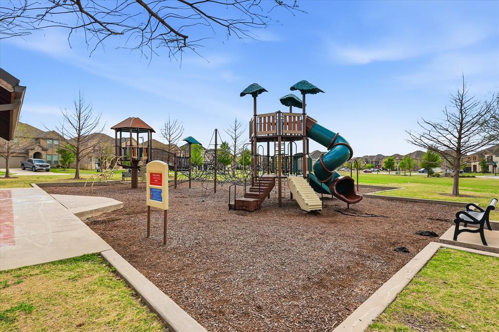 910 Cone Flower Drive Prosper, TX 75078 - Photo 39 of 40 a view of a park with swings