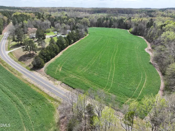an aerial view of a golf course with a garden