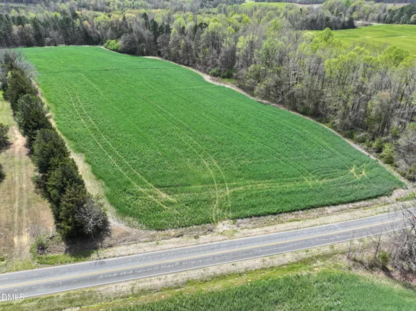 a view of a backyard of the house