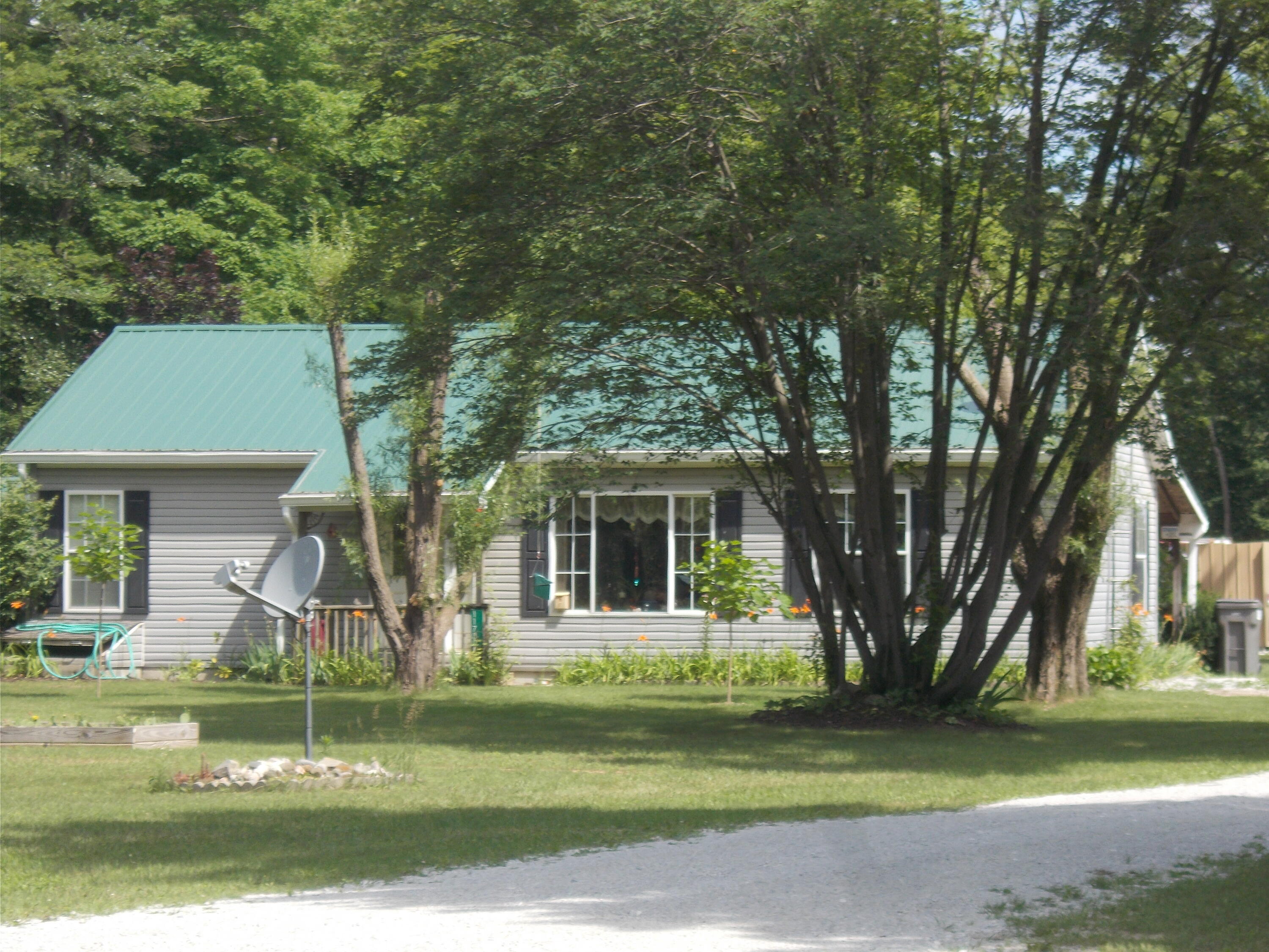 11700 Bailey Road Ravenna, MI 49451 - Photo 1 of 29 Front