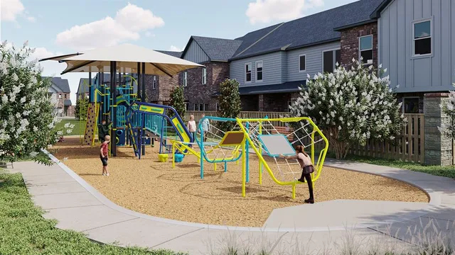 a view of a house with a floor to ceiling window and a table