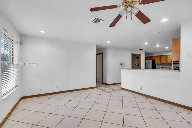 a view of an empty room and window