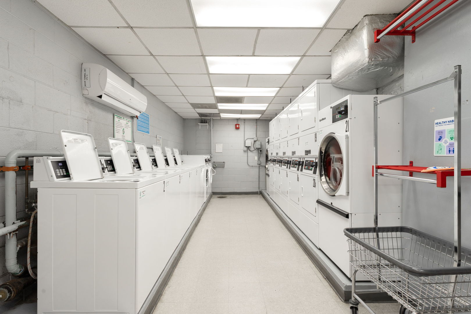 3900 North Lake Shore Drive, Unit 18F Chicago, IL 60613 - Photo 18 of 22 a view of a kitchen with furniture and a window