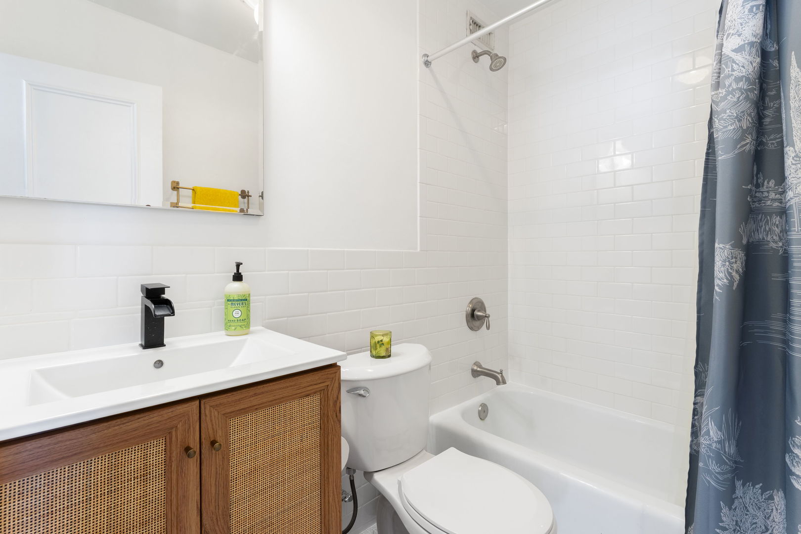3900 North Lake Shore Drive, Unit 18F Chicago, IL 60613 - Photo 10 of 22 a bathroom with a sink a toilet and shower