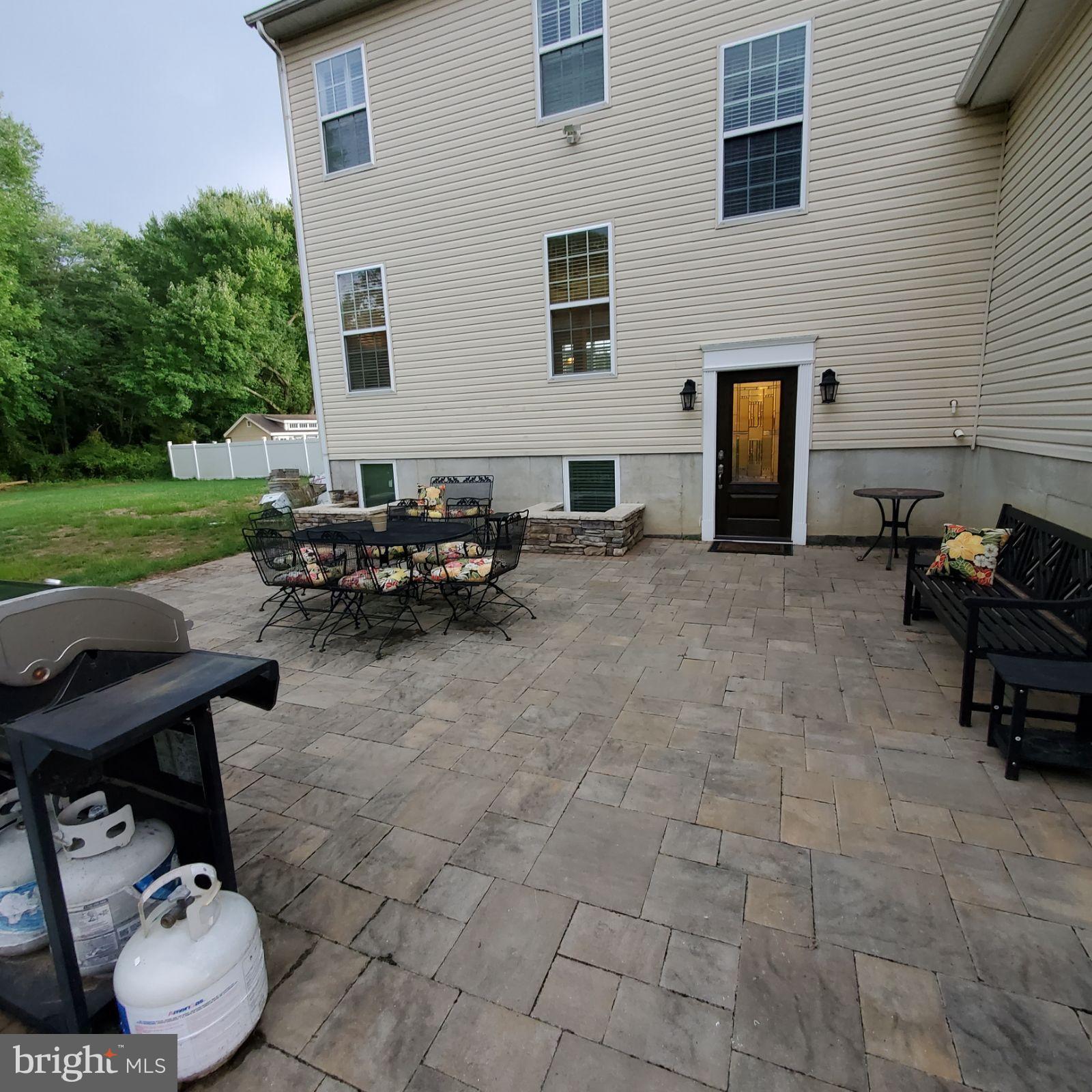 14 Taft Court Hainesport, NJ 08036 - Photo 43 of 47 Large paver patio & entrance to downstairs living