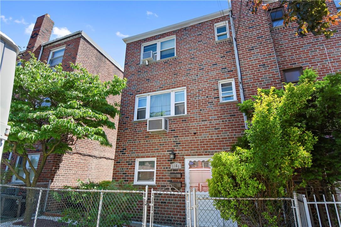 2568 Colden Avenue Bronx, NY 10469 - Photo 1 of 1 a brick building with a large windows