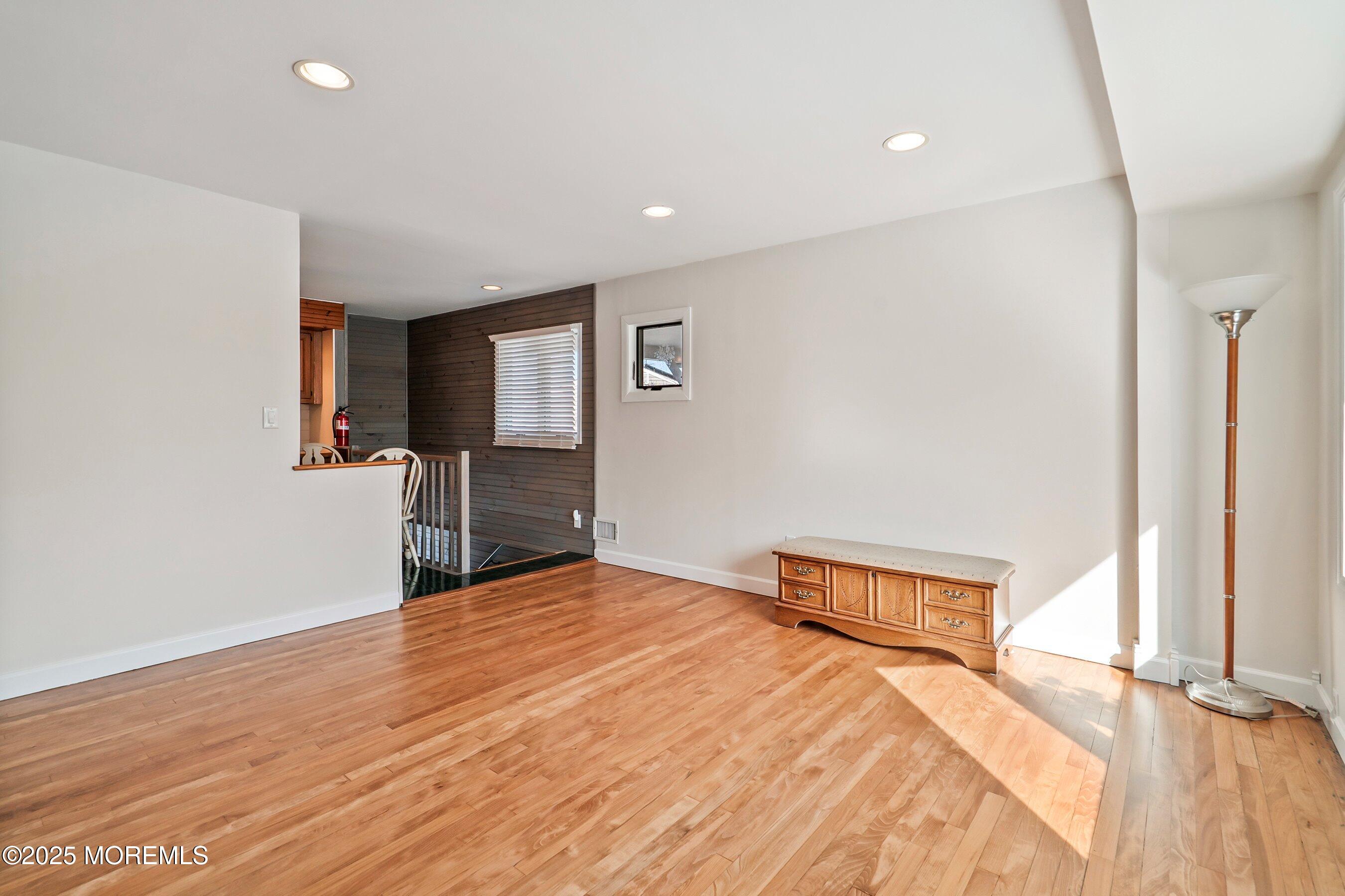 501 Stone Road Union Beach, NJ 07735 - Photo 4 of 30 a bedroom with a bed and a dresser