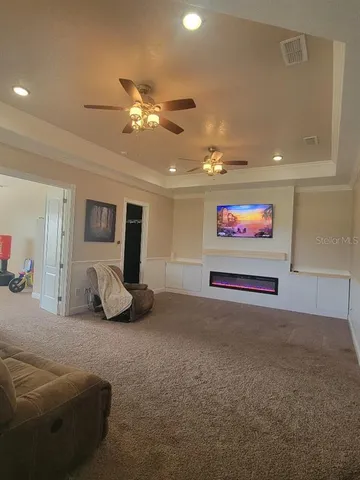 a view of a livingroom with furniture