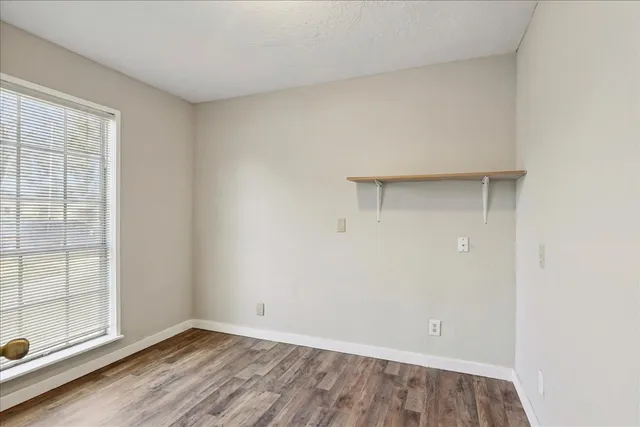 an empty room with sliding door