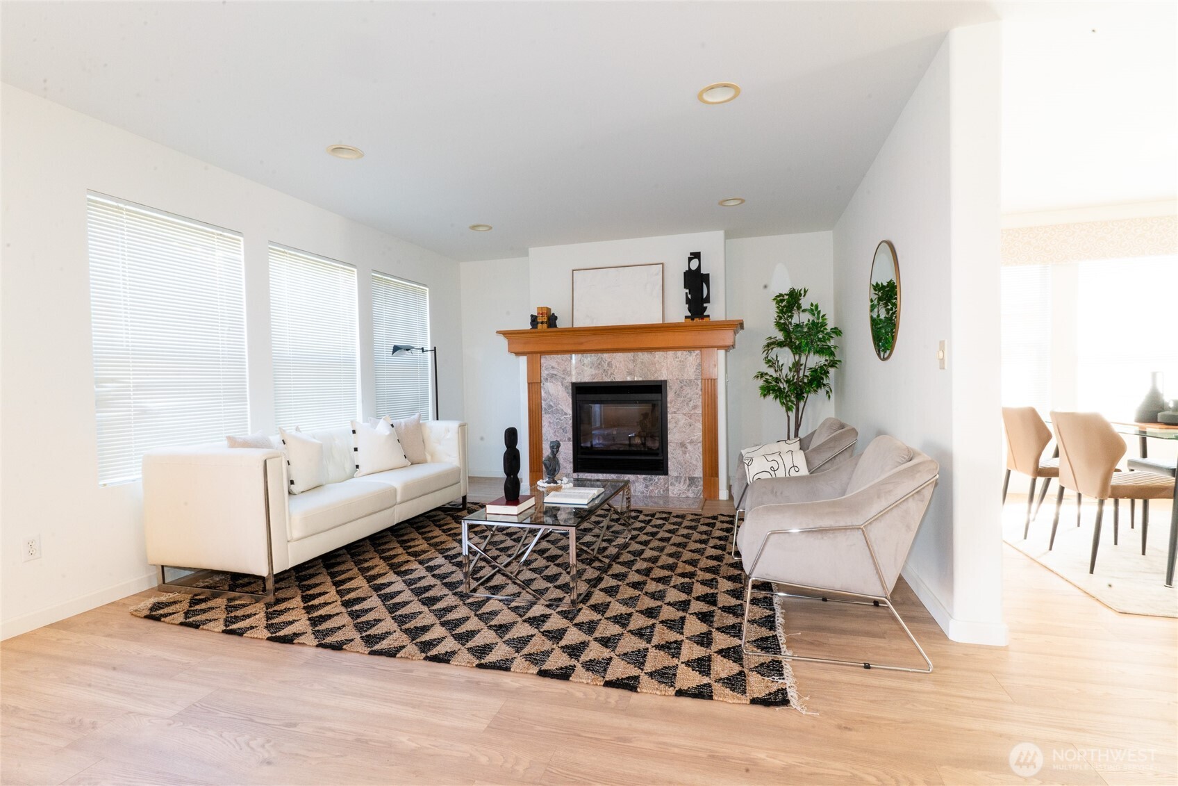 2322 Southeast 2nd Court Renton, WA 98056 - Photo 5 of 27 a living room with furniture a rug and a fireplace