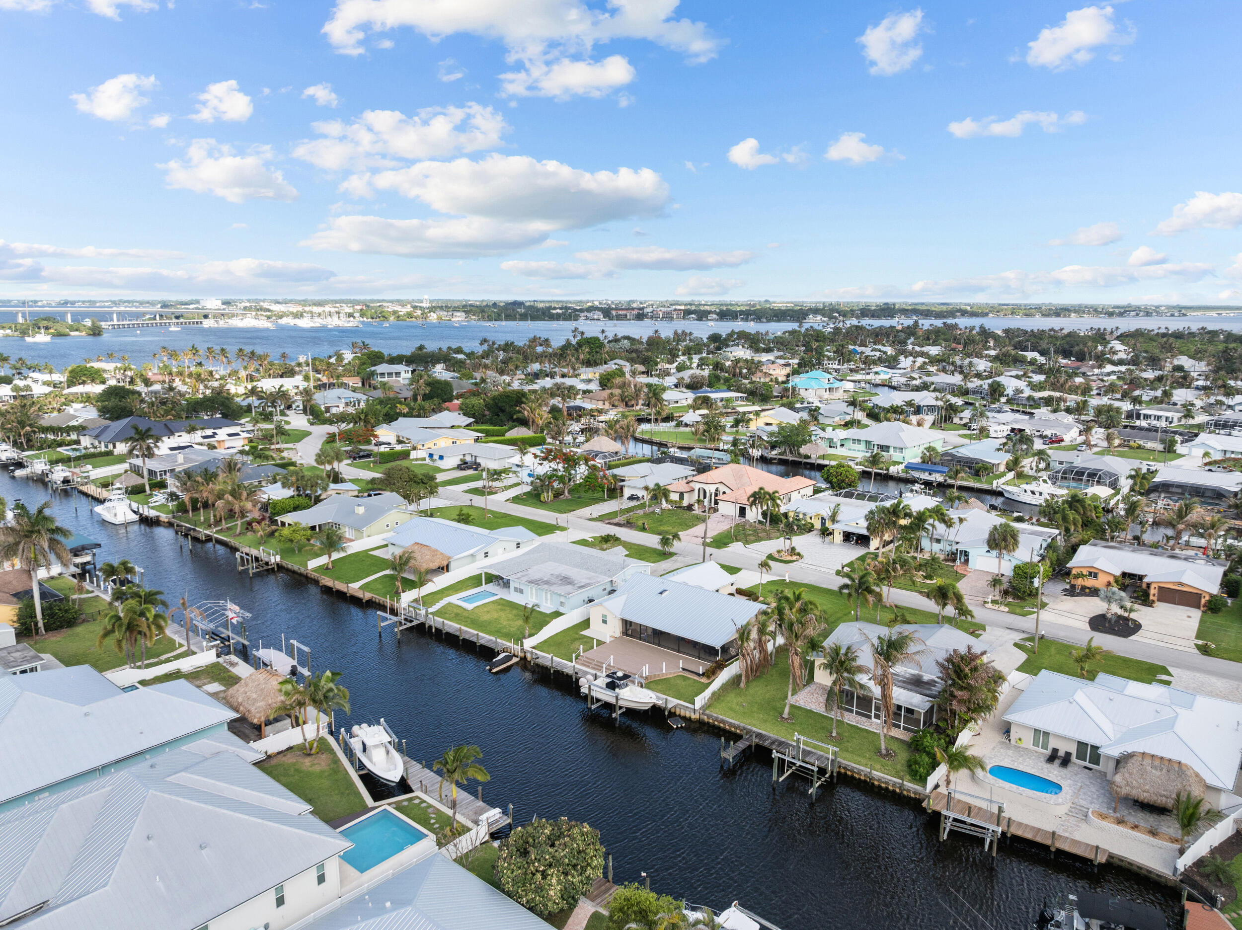1459 Southwest Seahawk Way Palm City, FL 34990 - Photo 34 of 43 an aerial view of residential building with parking space