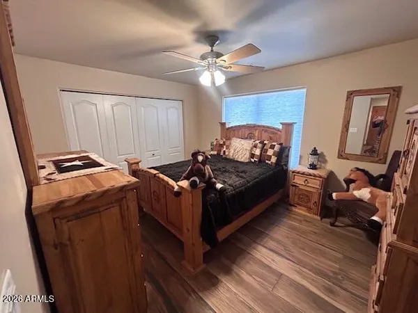 a bed room with furniture and a window