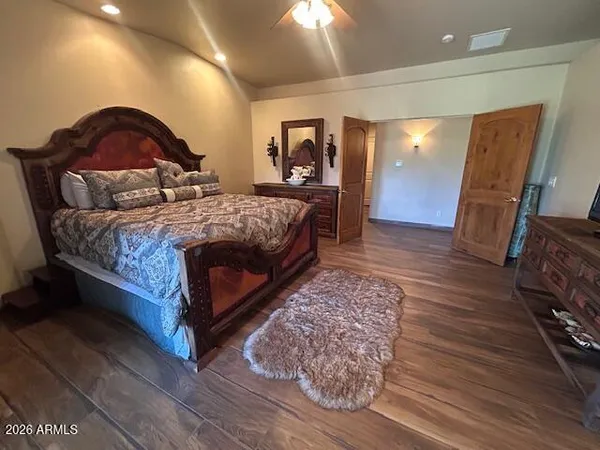 a view of a bathroom from a hallway