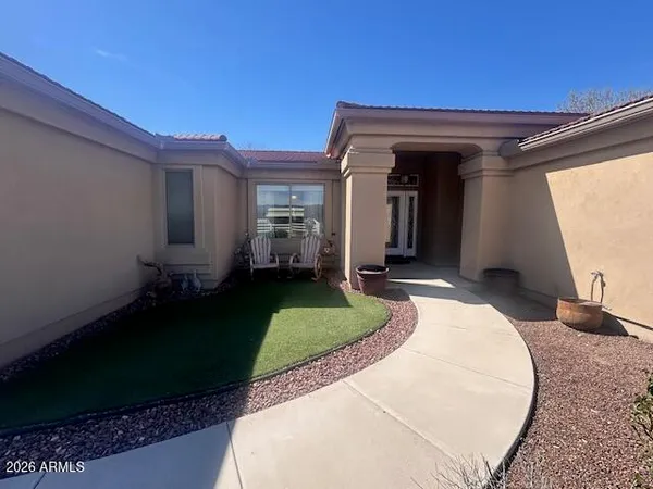 a view of a house with a porch