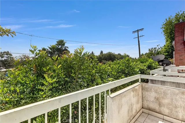 a view of a balcony with an outdoor space