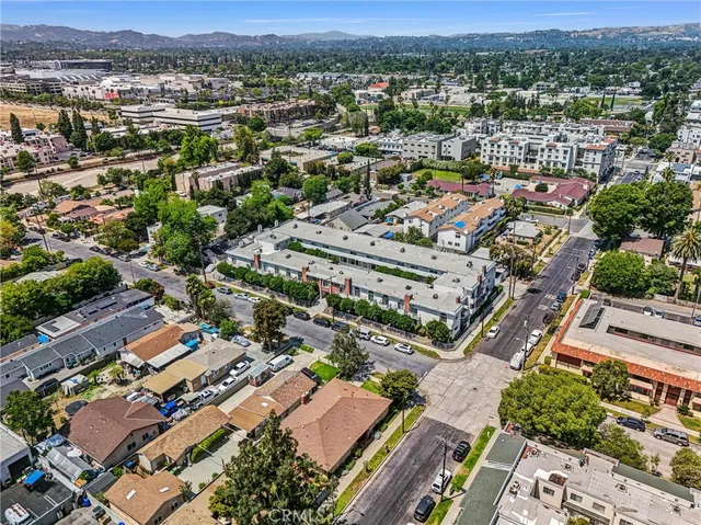 an aerial view of a city with lots of residential buildings