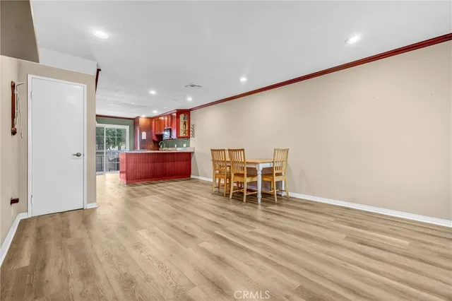 a room with furniture and wooden floor