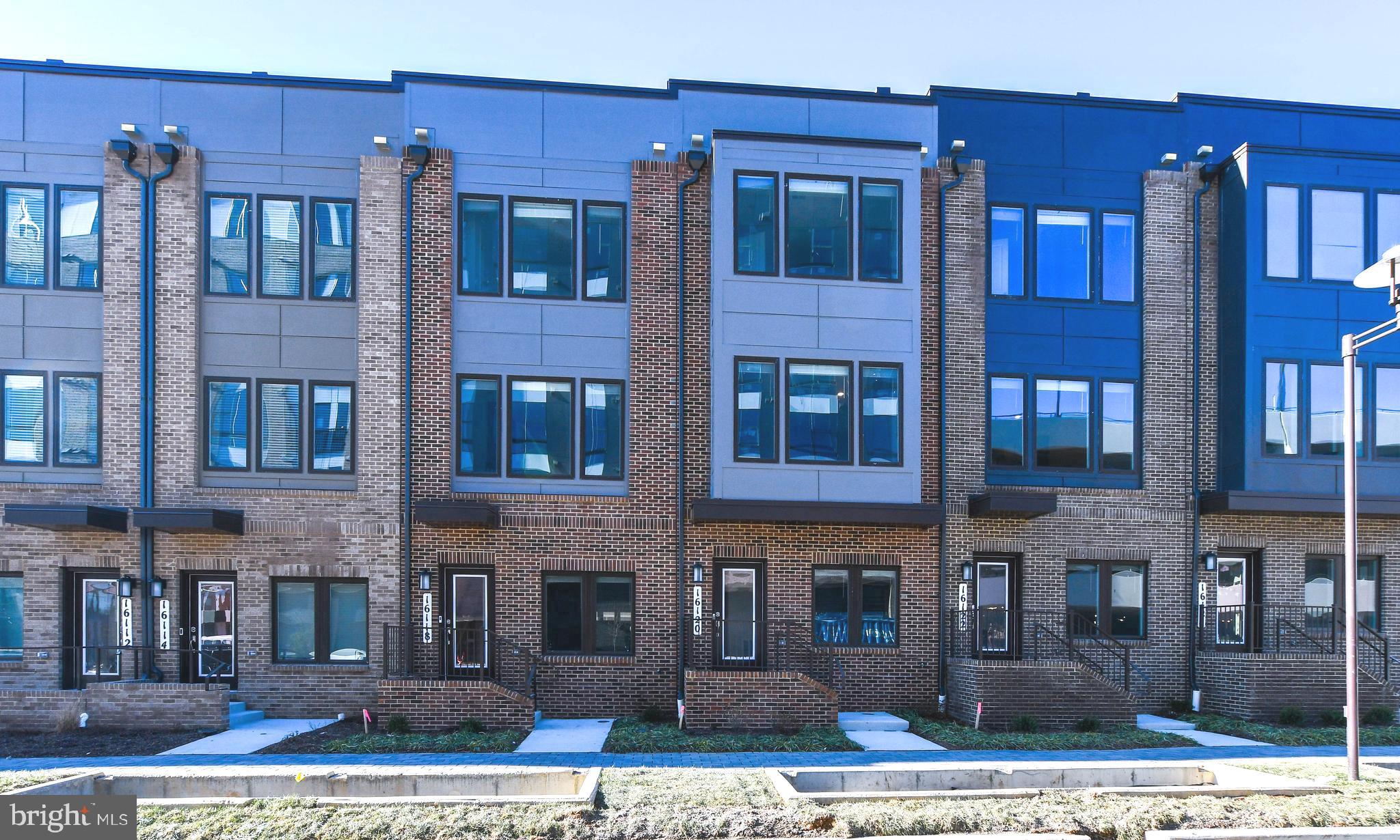 a front view of a building with windows