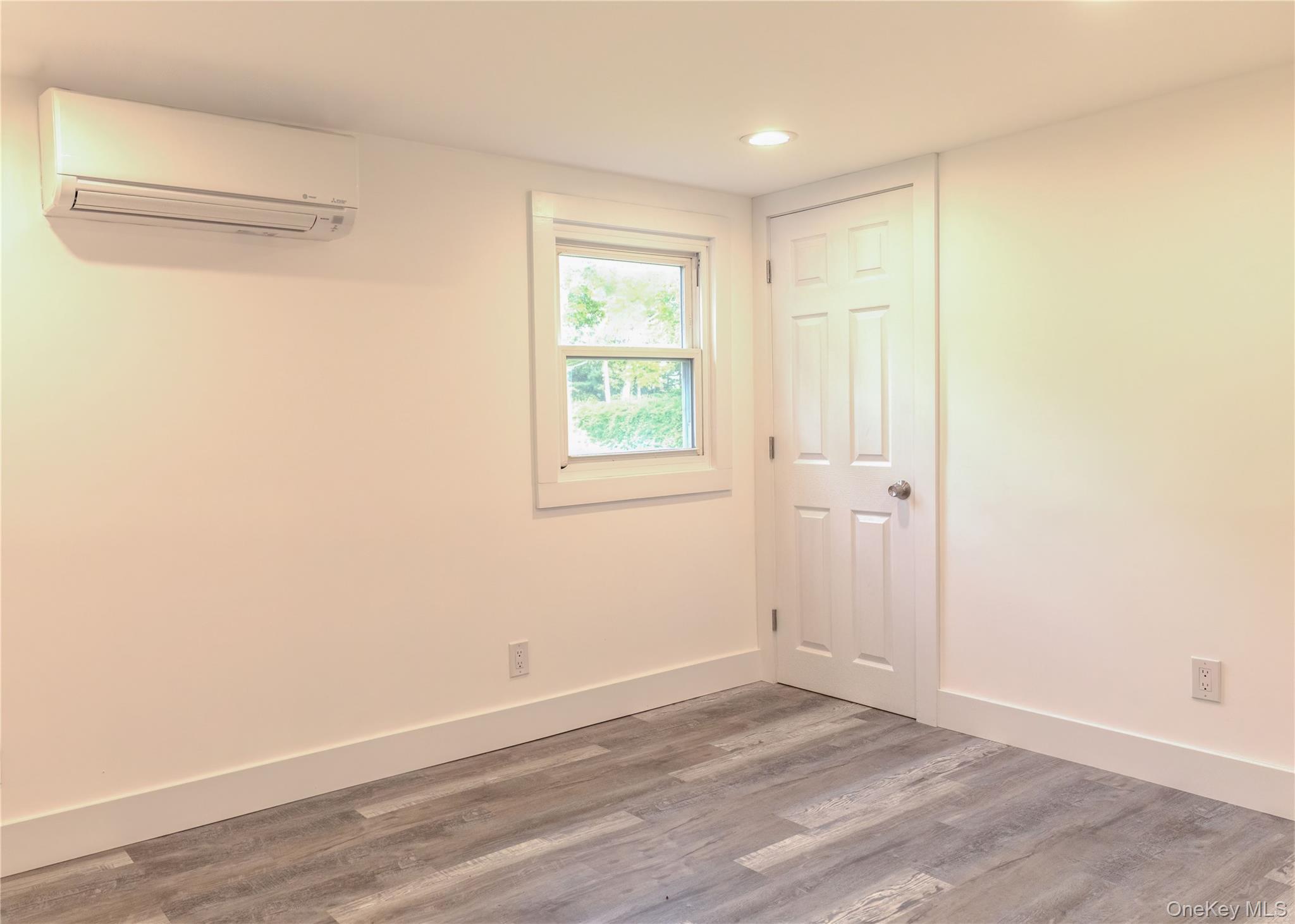 23 Lucille Road Carmel, NY 10512 - Photo 13 of 44 a view of a room with wooden floor and closet