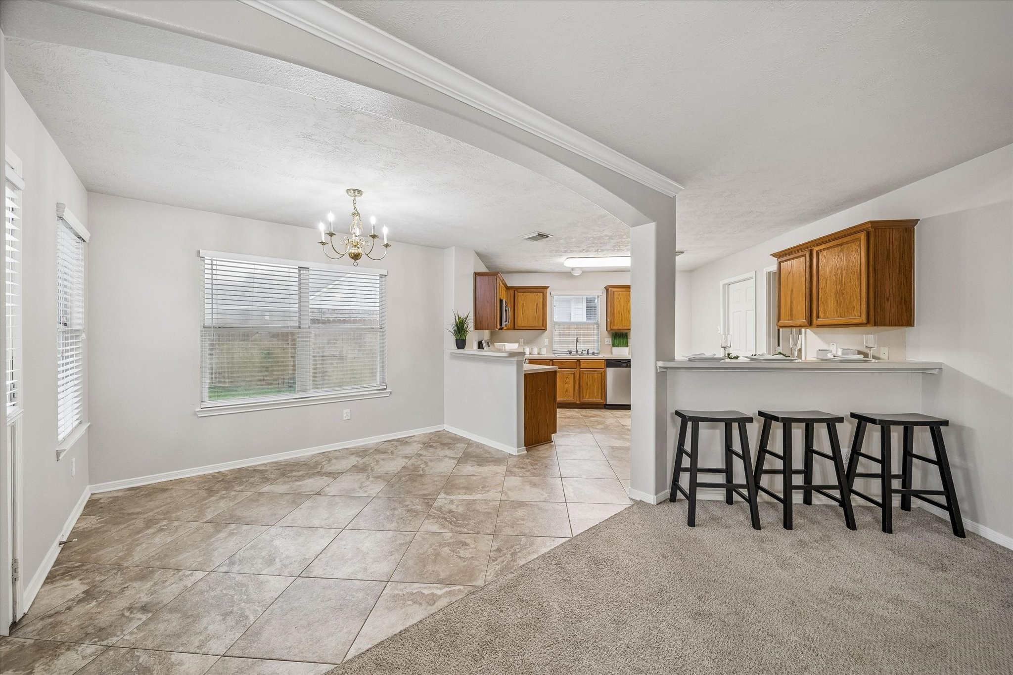 10307 Turrett Point Lane Houston, TX 77064 - Photo 4 of 12 a view of kitchen with furniture and window
