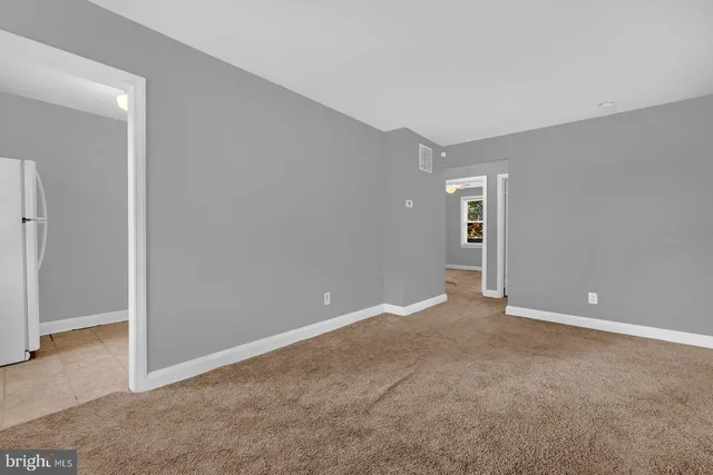 a view of an empty room with window