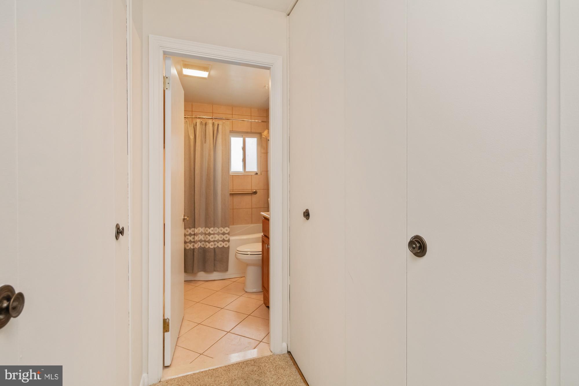 37 Haddington Road Lutherville-Timonium, MD 21093 - Photo 26 of 36 Hall into the main floor bathroom/large closets
