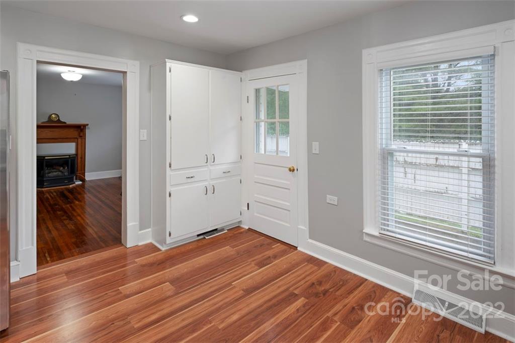 2139 Quaker Road Siloam, NC 27047 - Photo 21 of 35 a bedroom with a bed and a window
