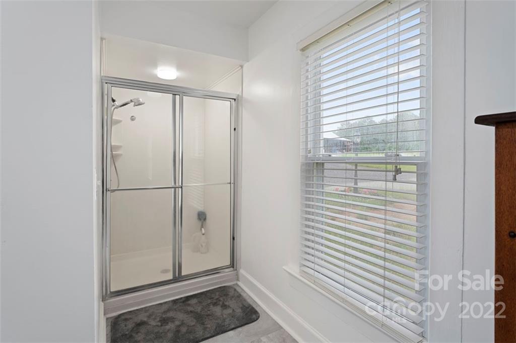 2139 Quaker Road Siloam, NC 27047 - Photo 29 of 35 a view of a bathroom with a sink