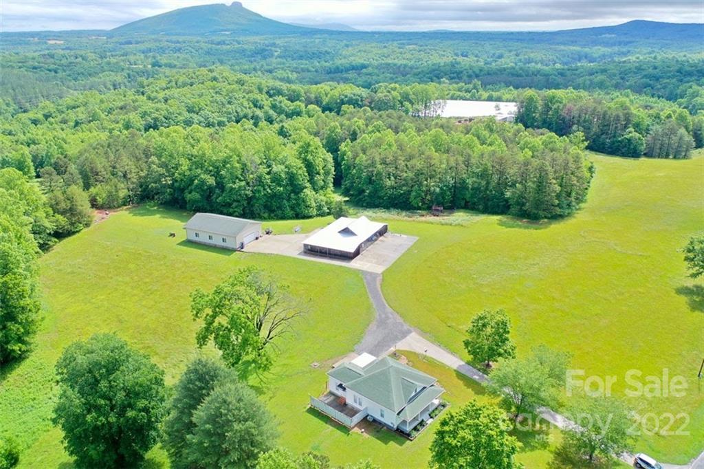 2139 Quaker Road Siloam, NC 27047 - Photo 3 of 35 an aerial view of a residential houses with outdoor space