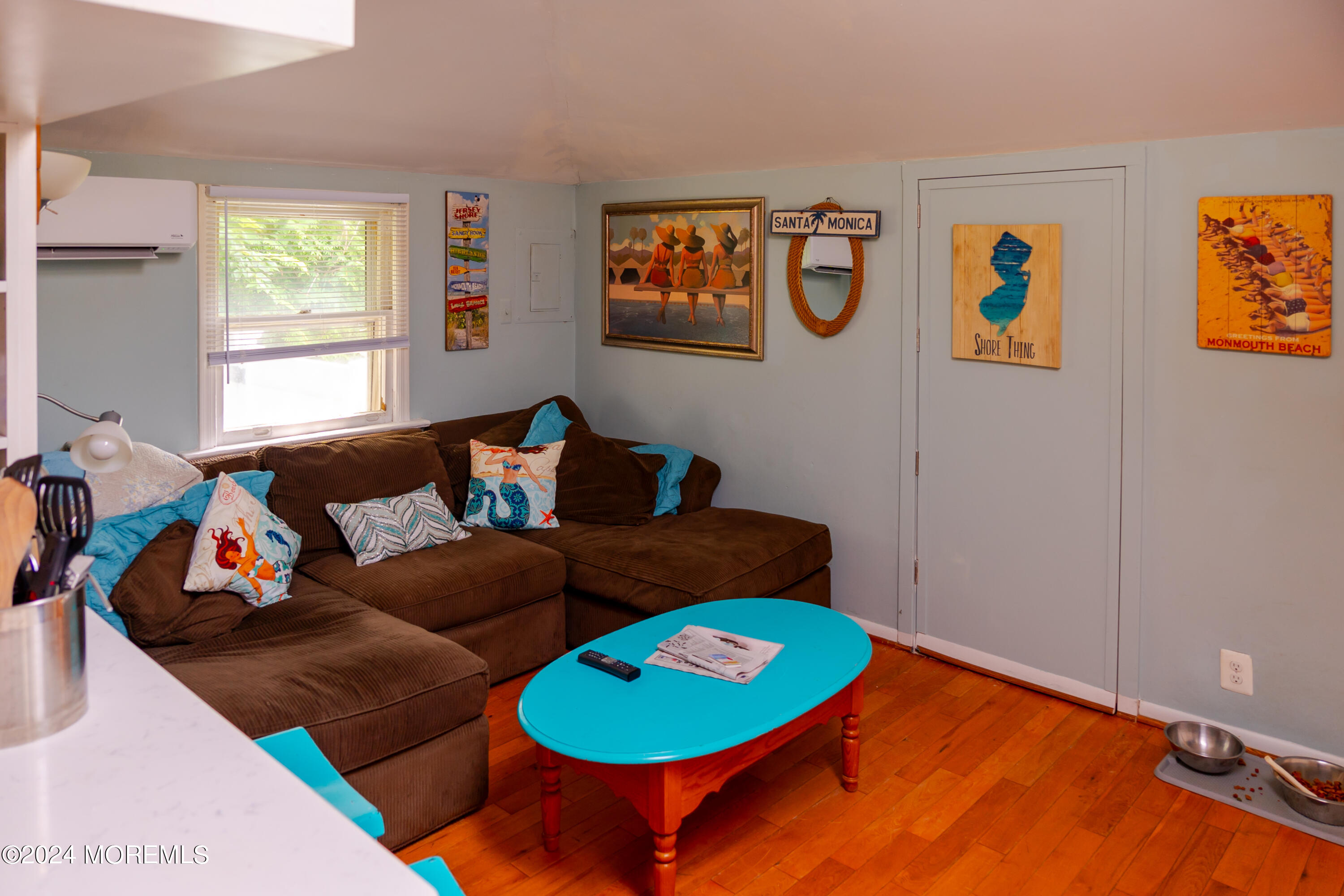 18 Valentine Street, Unit REAR Monmouth Beach, NJ 07750 - Photo 5 of 13 a living room with furniture and a wooden floor