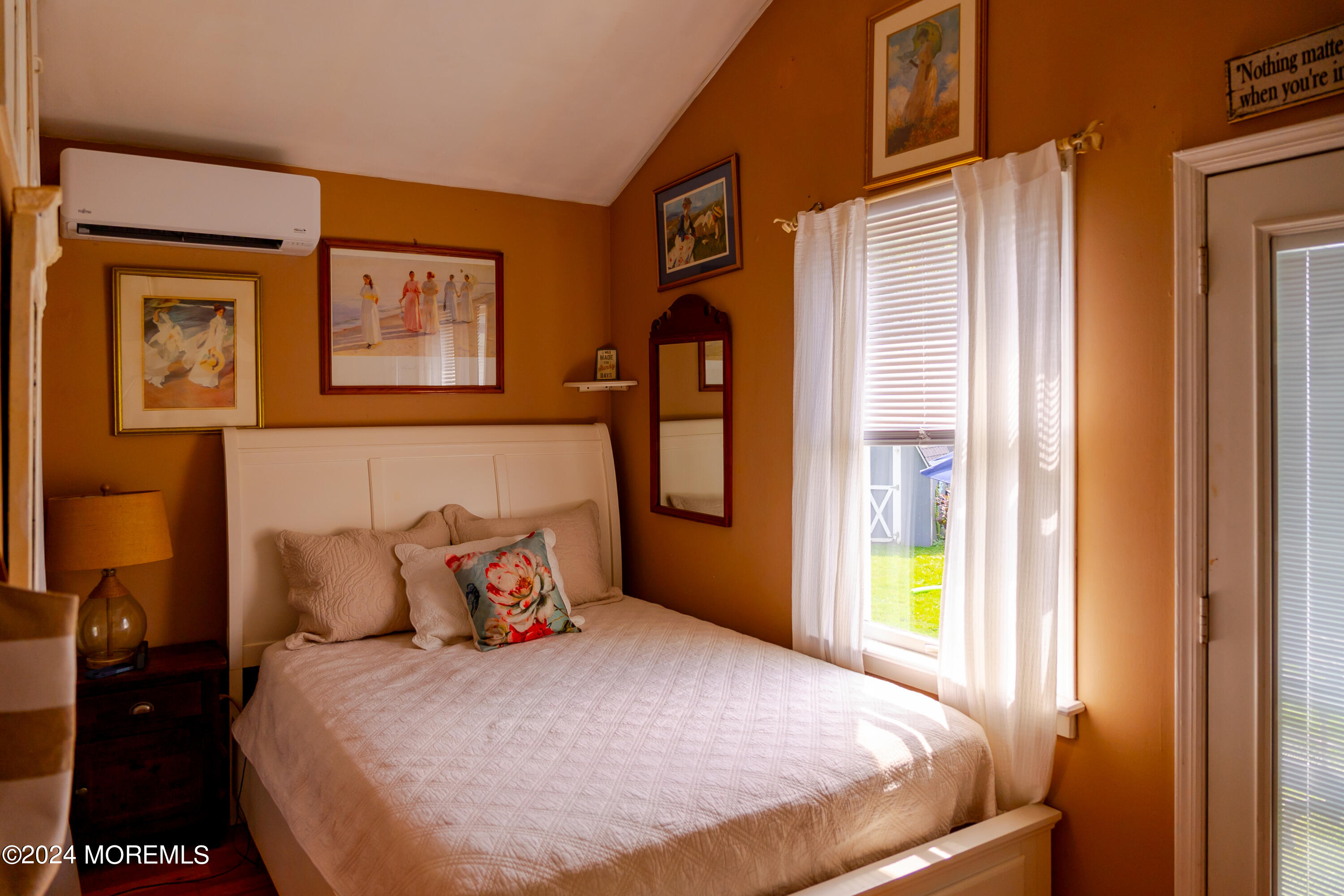 18 Valentine Street, Unit REAR Monmouth Beach, NJ 07750 - Photo 7 of 13 a bedroom with a bed and a window