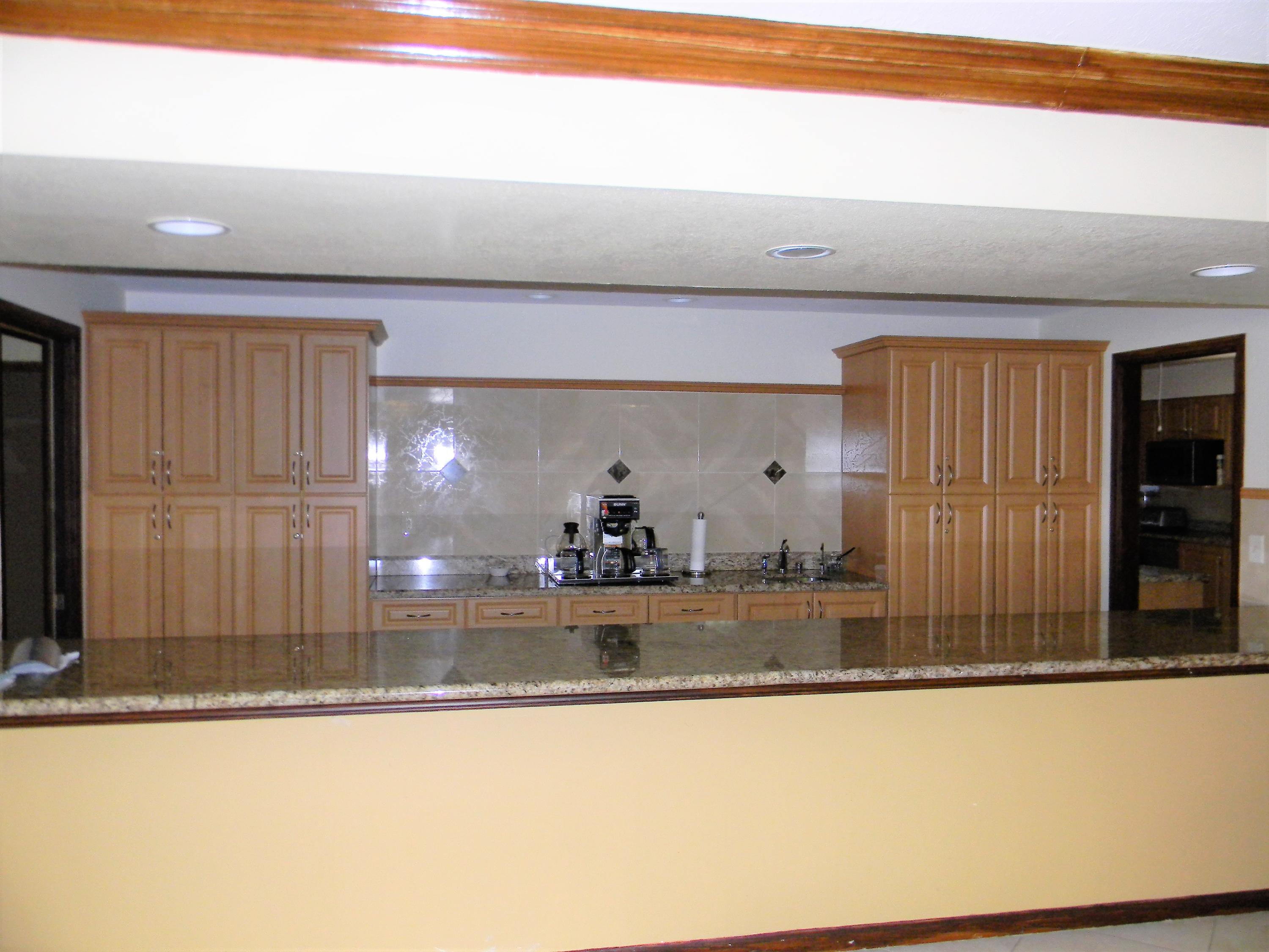 4595 Laurel Tree Road, Unit B Boynton Beach, FL 33436 - Photo 24 of 31 Clubhouse Kitchen