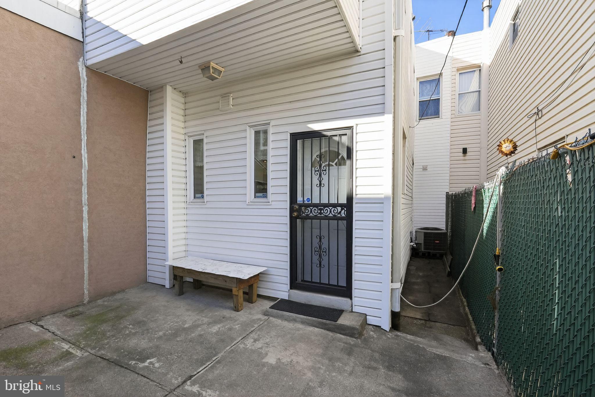 2515 South 16th Street Philadelphia, PA 19145 - Photo 14 of 29 a view of a back yard of the house