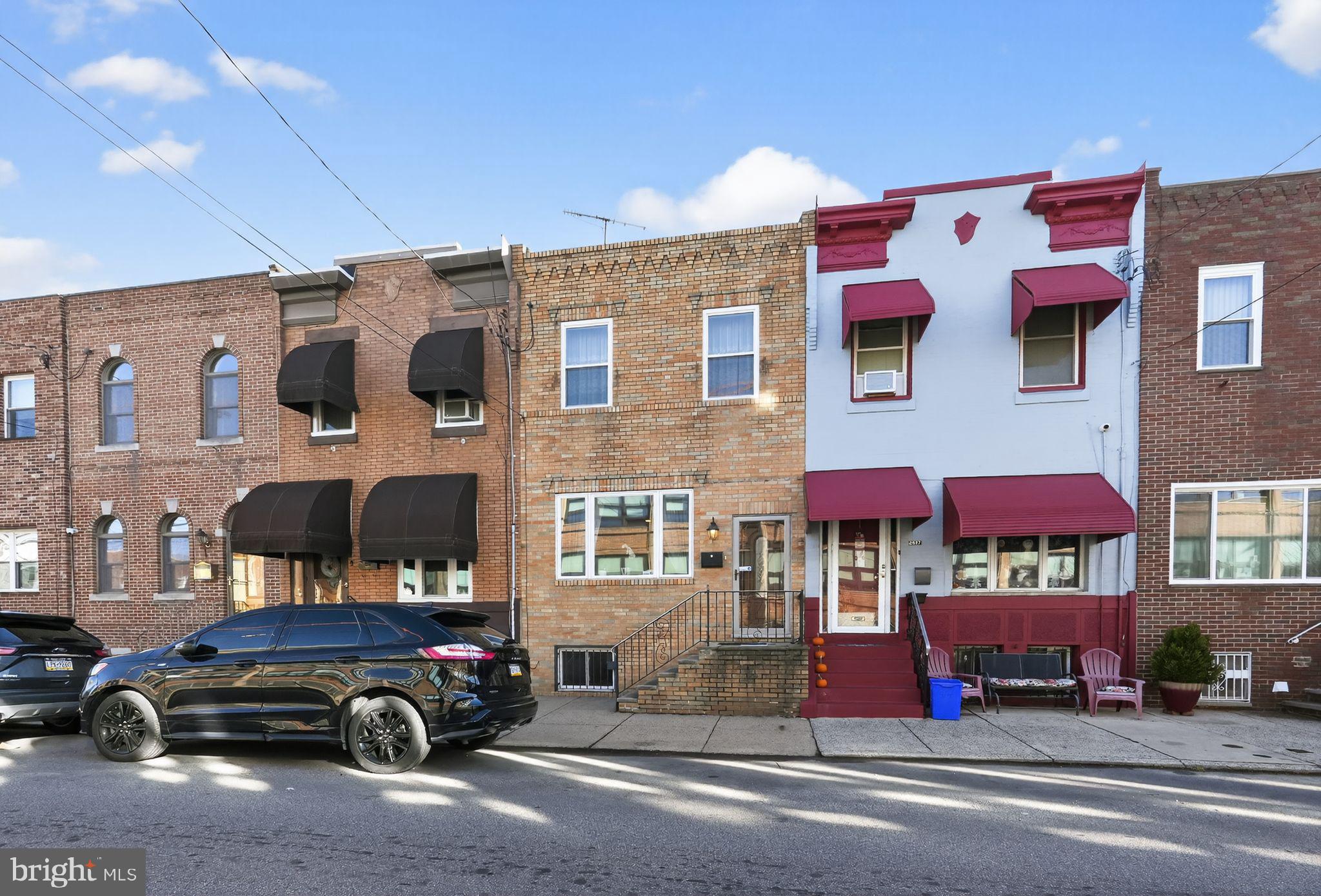 2515 South 16th Street Philadelphia, PA 19145 - Photo 2 of 29 a car parked in front of a building