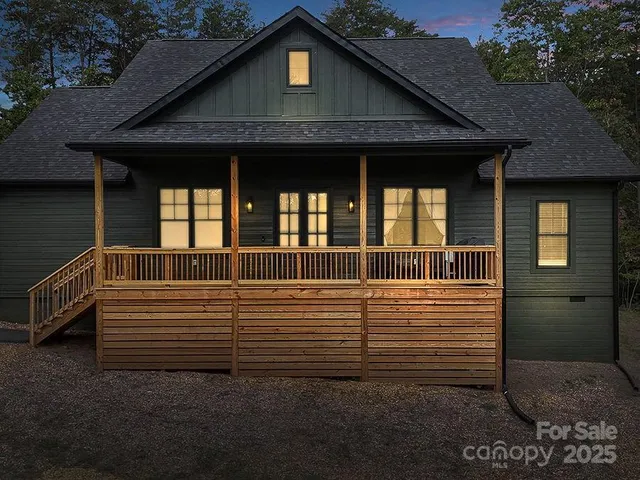a view of a house with a small yard