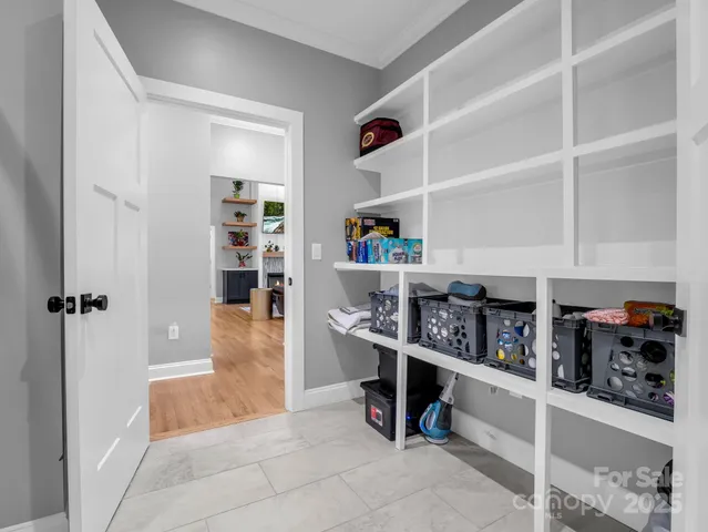 a room with storage and utility