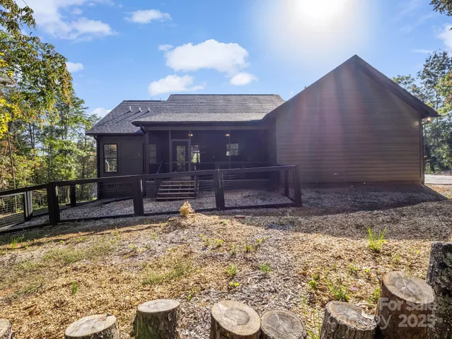 a view of a backyard of the house