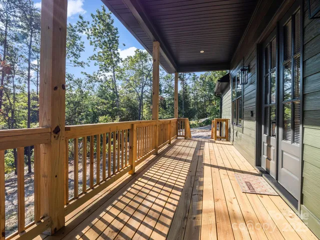 a view of balcony with furniture