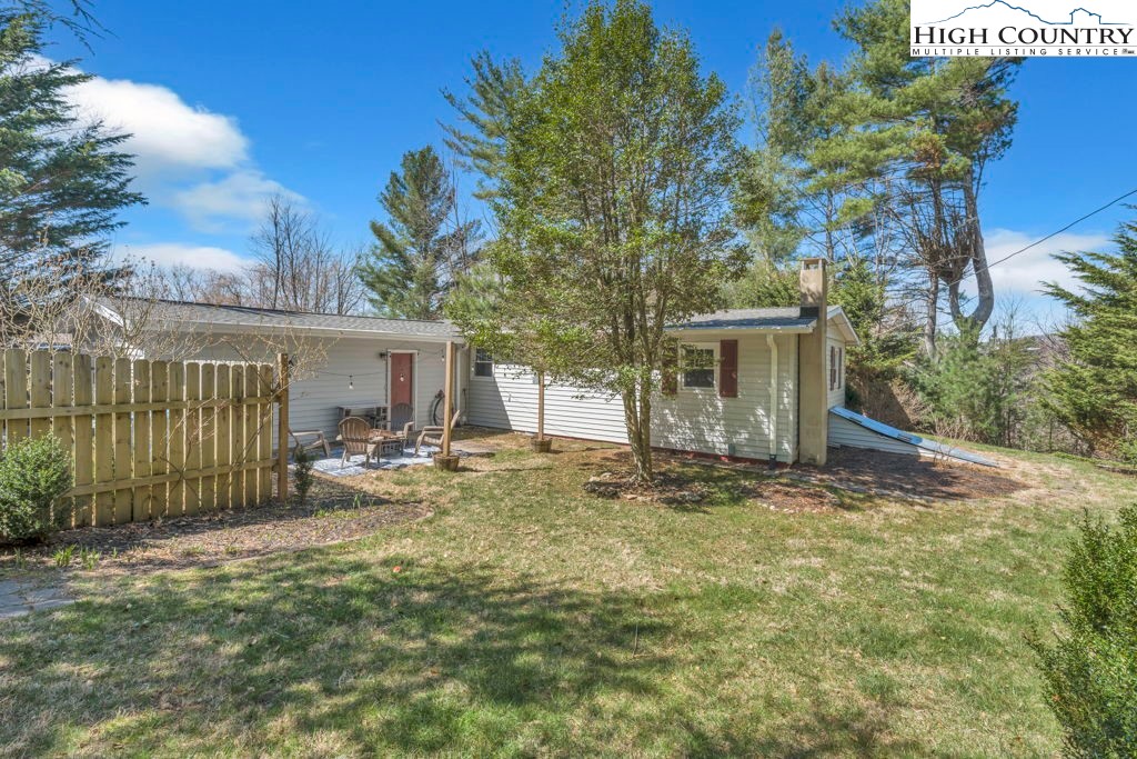 156 Olancha Avenue Boone, NC 28607 - Photo 4 of 23 a view of a house with backyard and sitting area