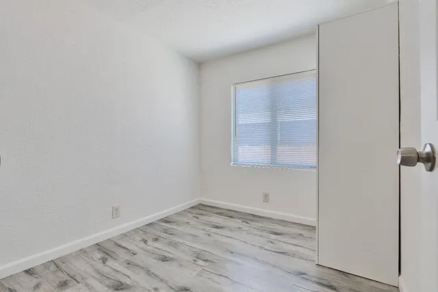 a view of a room that has a window