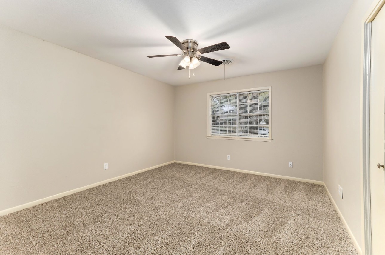 1609 Longhofer Street Brenham, TX 77833 - Photo 16 of 18 a view of an empty room with a window