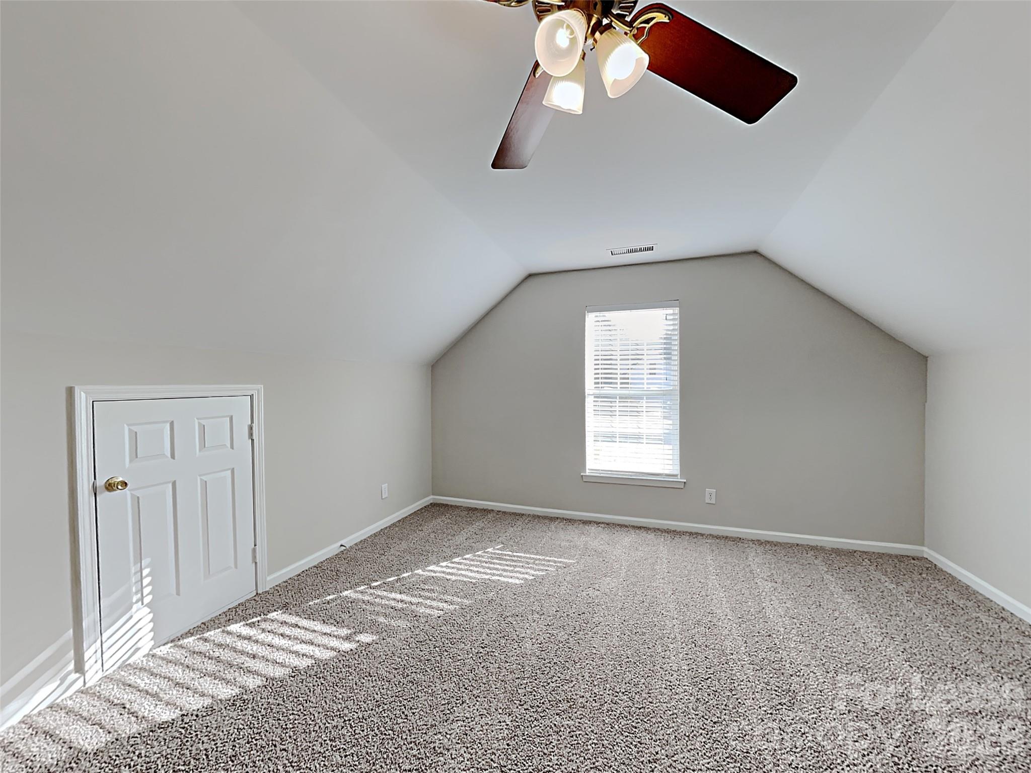 1015 Clearbrook Road Matthews, NC 28105 - Photo 14 of 25 a view of an empty room with a window