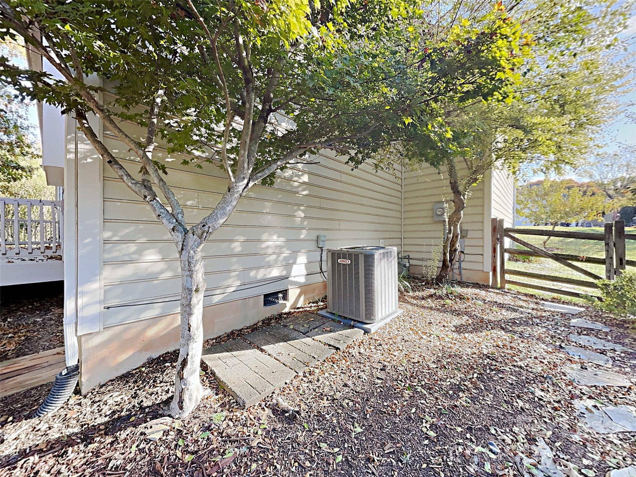 1015 Clearbrook Road Matthews, NC 28105 - Photo 23 of 25 a backyard of a house with barbeque oven and outdoor seating