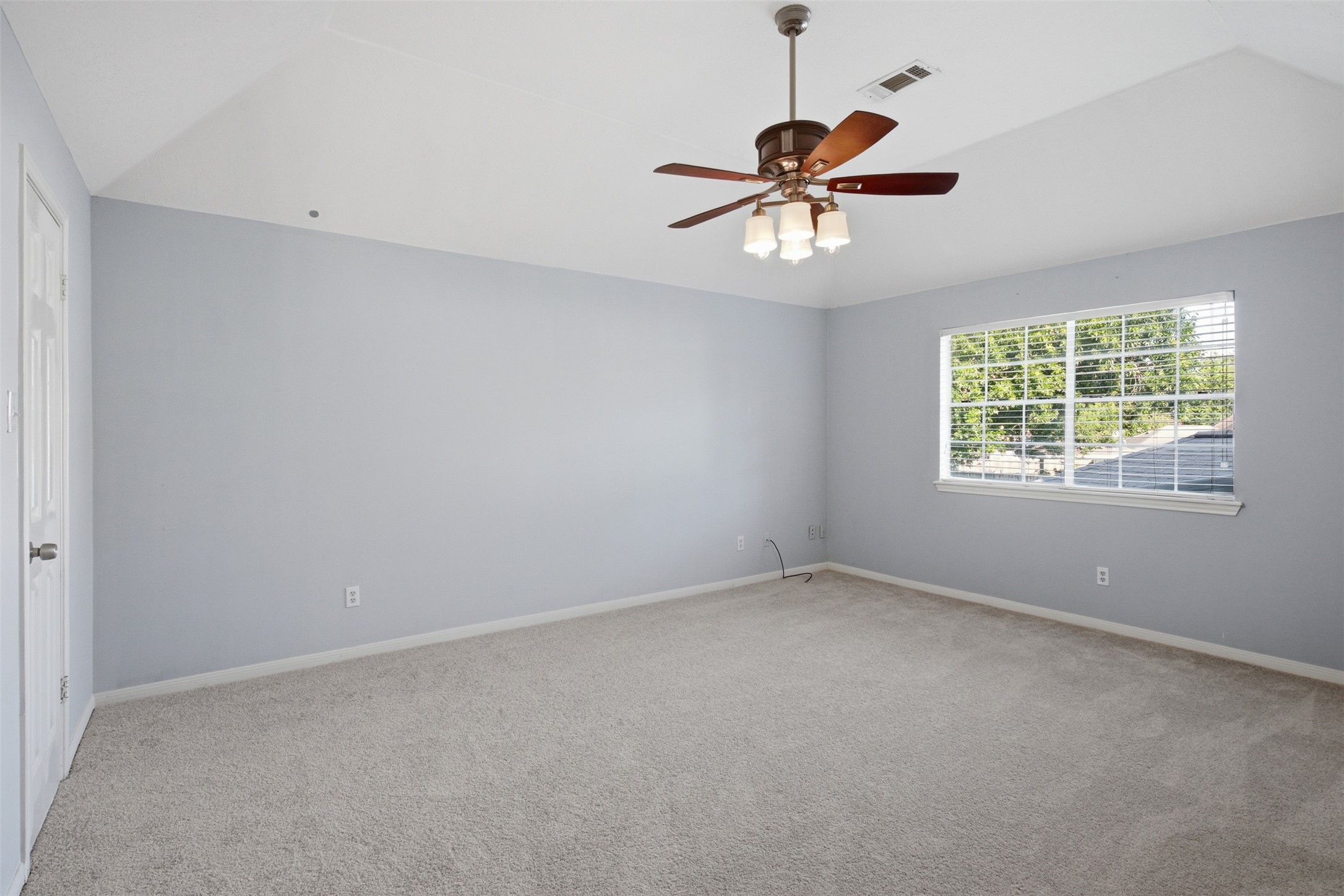 323 Magic Oaks Court Spring, TX 77388 - Photo 31 of 49 At the top of the stairs is an oversized gameroom with a vaulted ceiling. This space can be used and decorated to your taste and needs.