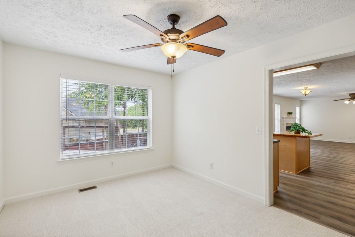 1948 Portway Road Spring Hill, TN 37174 - Photo 8 of 28 an empty room with fan and windows
