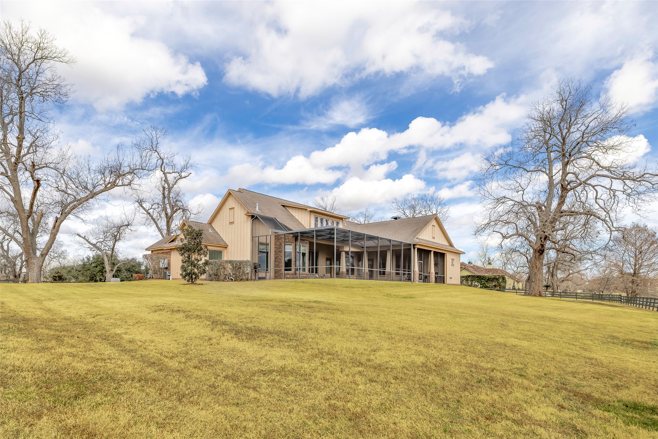 31102 Lower Oxbow Trace Fulshear, TX 77441 - Photo 3 of 50 RARE OPPORTUNITY to live in much sought after Fulbrook Neighborhood on a large 1.16 acre
lot on Oxbow Lake. This fabulous 3 bed, 3.1 bath, 3 car garage with covered, heated large
pool & spa has lots of outside sitting areas by the pool & front door to entertain & relax
with friends & family.