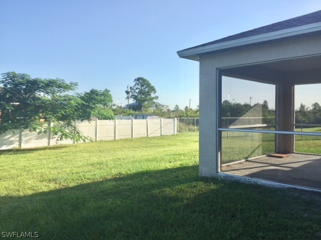 3608 13th Street Southwest Lehigh Acres, FL 33976 - Photo 11 of 11 a view of pool with a big yard